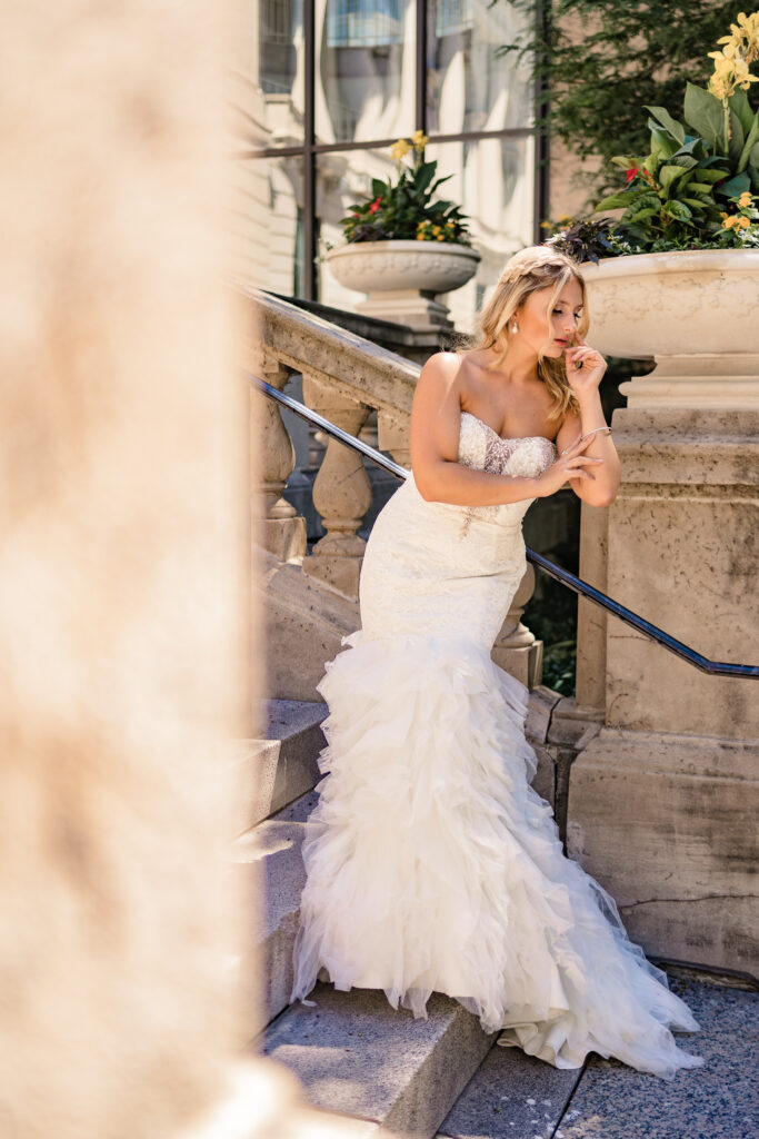 bride standing on a staircase during her wedding