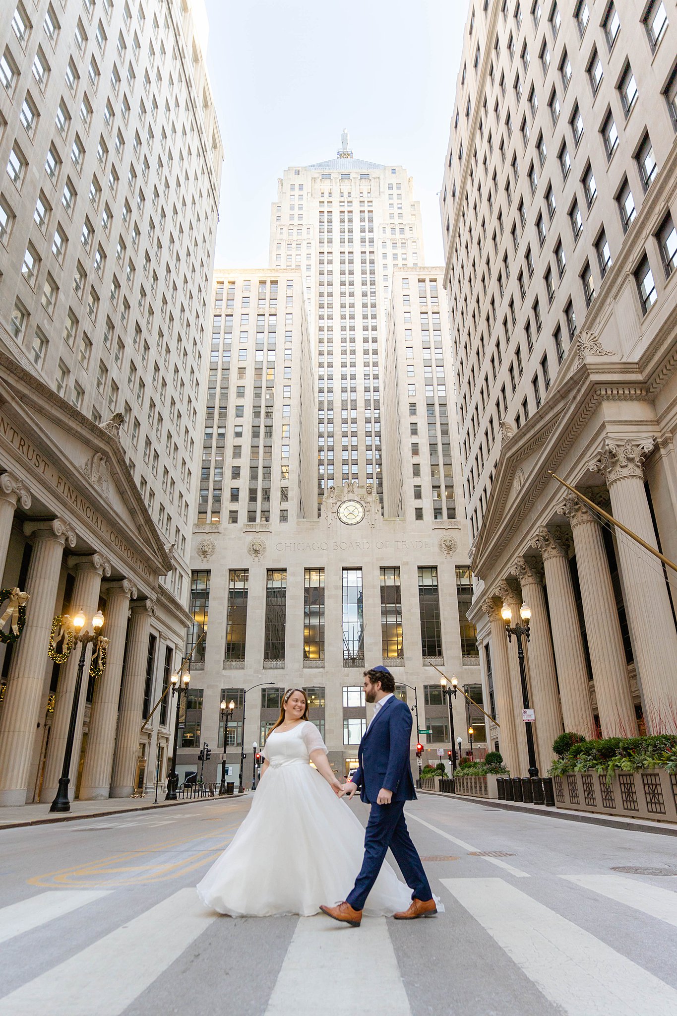 bride and groom walking outside of a chicago wedding venue taken by a Jewish Wedding Photographer