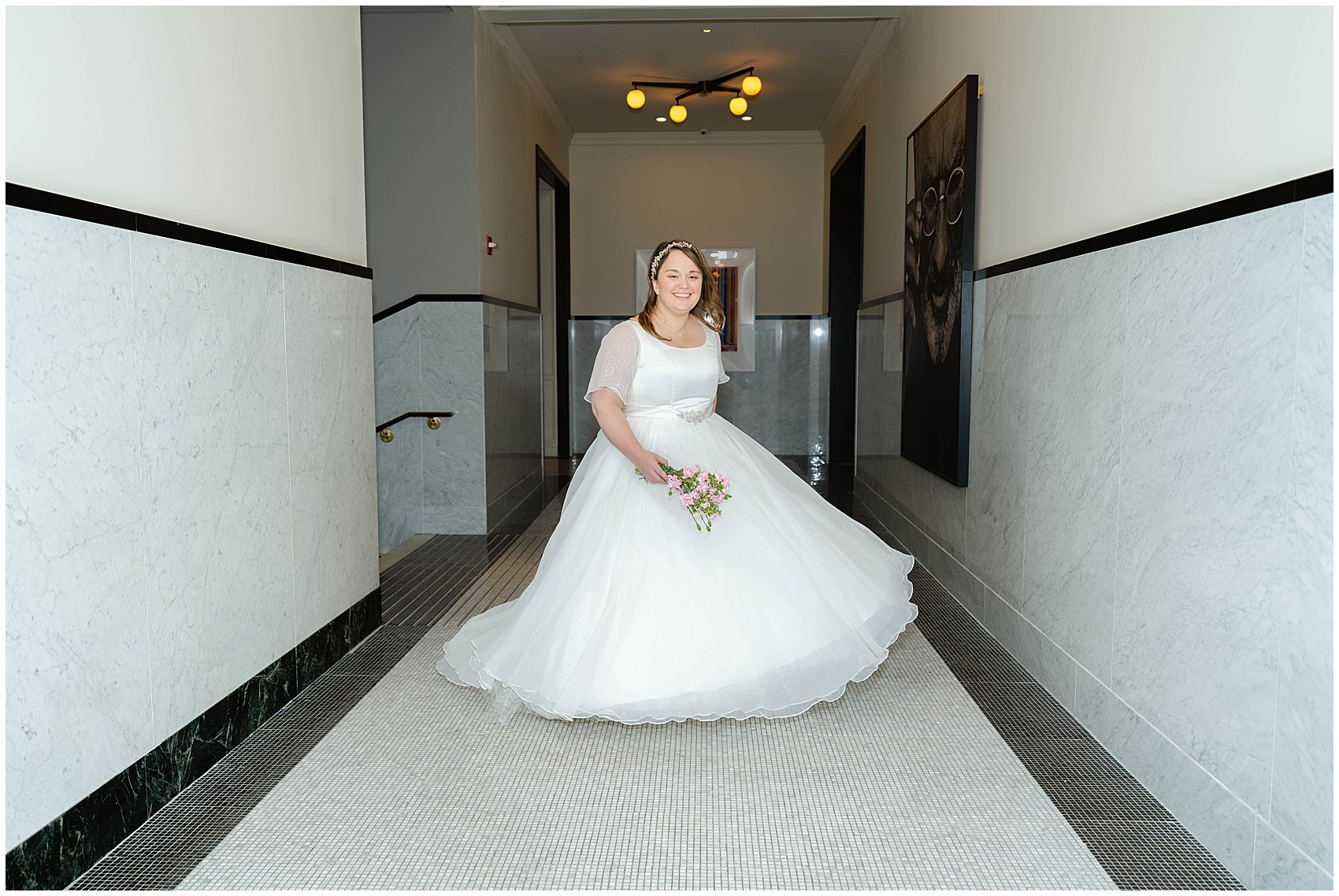 bride twirling in her dress at her Kimpton Gray Wedding