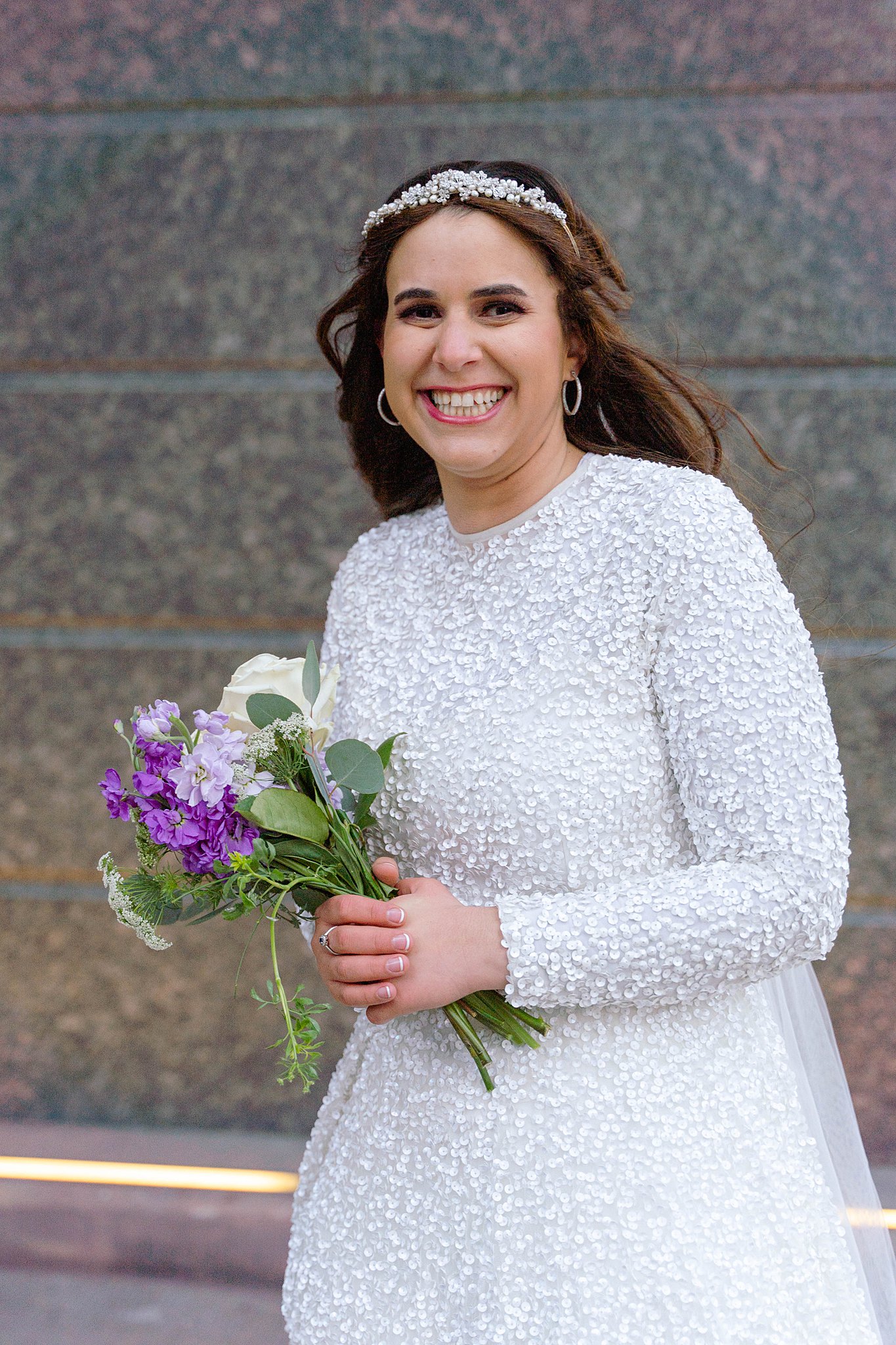 bride holding a bouquet of purple and white flowers the drake hotel wedding