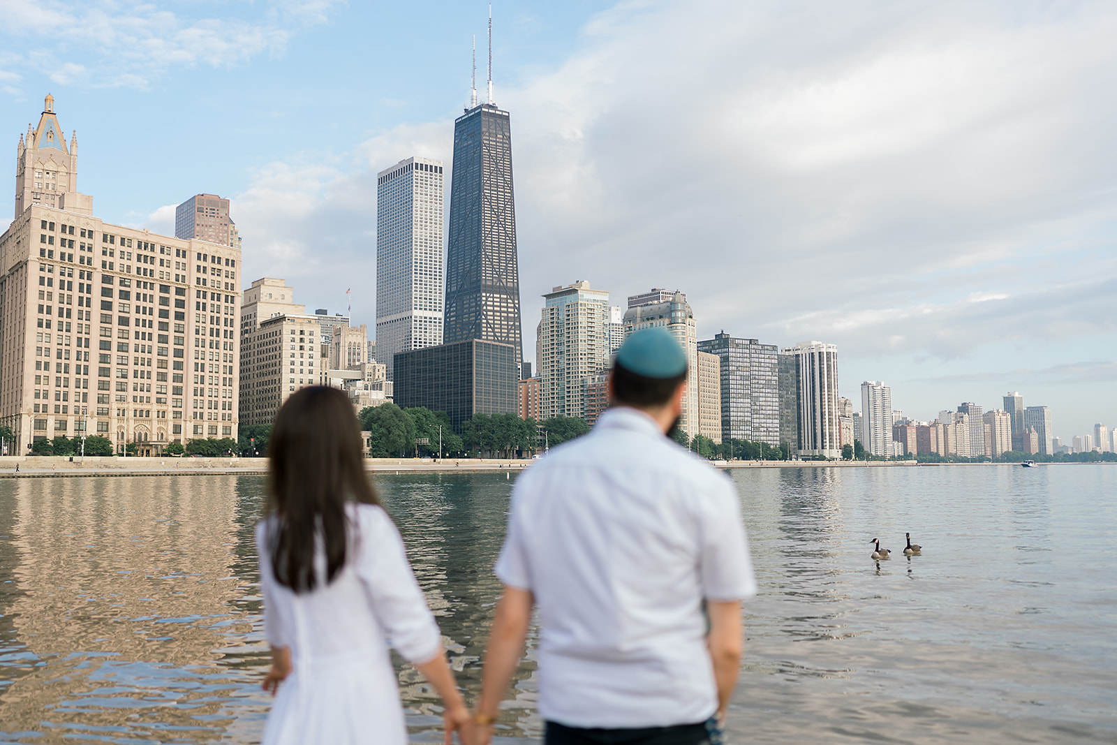 A Jewish couple looks out over Lake Michigan on thier honeymoon